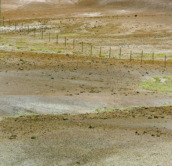 Nazlini fence on mudhills